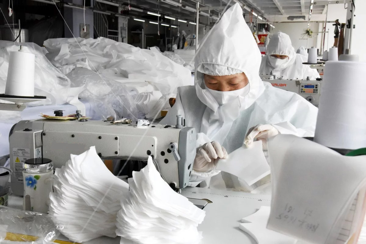 China boosts face mask production capacity by 450 per cent in a month